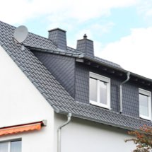 Photo d'illustration : maison avec de nouvelles fenêtres